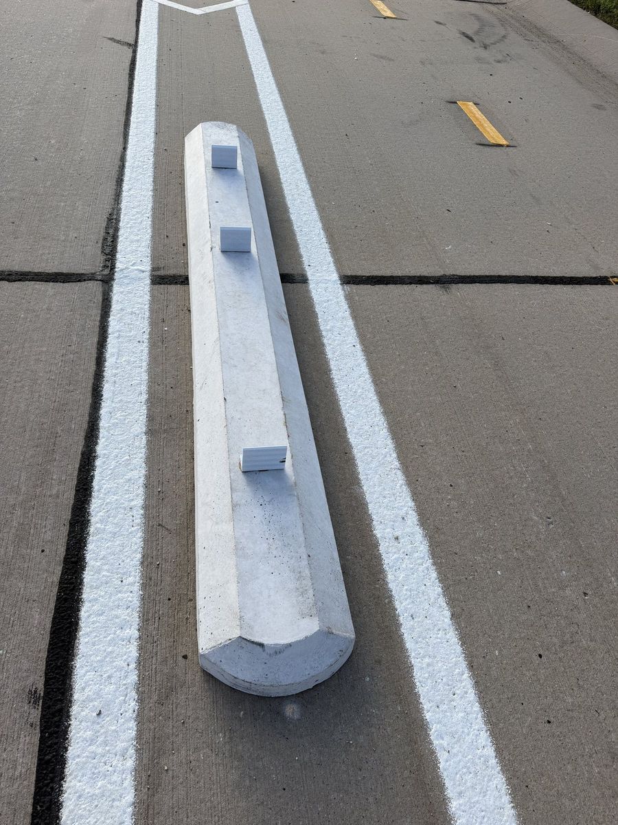 Route photo 107: South Concrete Barrier 65, Tire Marks